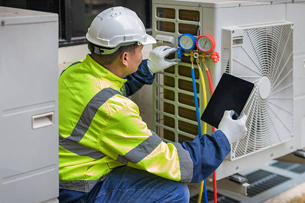 Professional Air Conditioning Repair technician working in Minot, MA